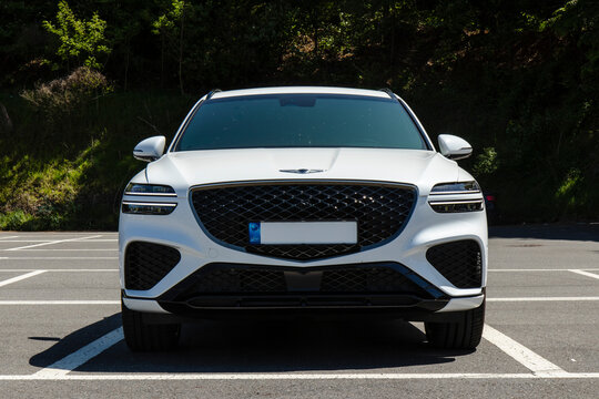 May 9, 2021, Seoul, South Korea - Front view of a white Genesis GV70 3.5T SUV parked in an outdoor lot