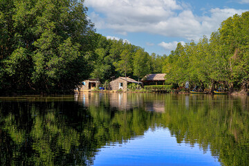 Obraz premium Landscape on a river with a boat