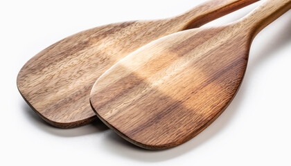 Two Wooden Cooking Paddles Resting Side by Side.