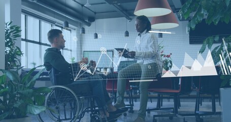 Discussing team reviewing data in office, wheelchair user in hoodie holding laptop with holograms