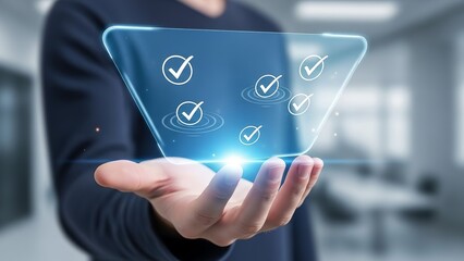 A person holding a glowing digital checklist in their hand, symbolizing verification and approval in a modern office setting.