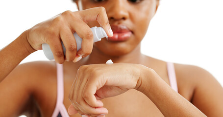 Hands, woman or cream in studio with bottle, hydration or treatment for even skin tone. African...
