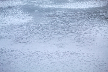 Winter Rain Falling on Snow Creating Soft Ripples