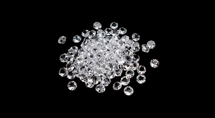 Sparkling diamonds scattered on glossy black backdrop, revealing luxurious brilliance and sophisticated glamour of precious stones