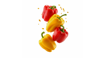 Vibrant red and yellow bell peppers with water droplets floating against a black background