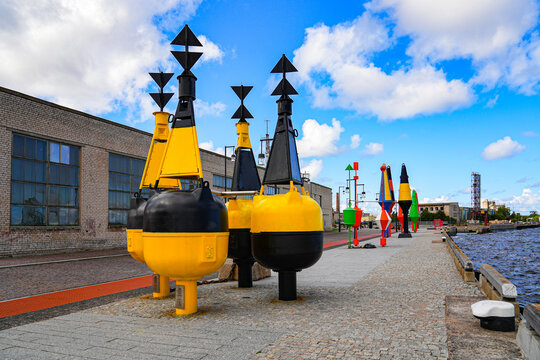 Navigation buoys exhibition on the waterfront promenade of Ostas Street in the port of Ventspils, Latvia