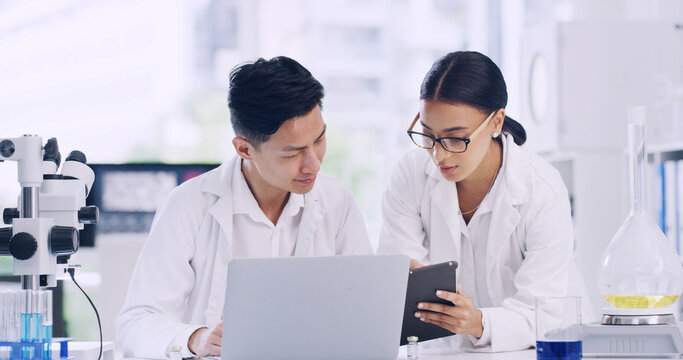 Conversation, laptop and tablet with scientist people in laboratory for planning or research. App, collaboration and science with medical team at work on computer for clinical trial or investigation