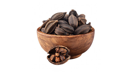 Aromatic black cardamom pods in a wooden bowl, a staple spice for rich culinary flavors