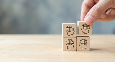 Adult hand assembling wooden blocks with a human head and digital brain icon, representing artificial intelligence and mental health concept, indoors on a table with soft lighting.