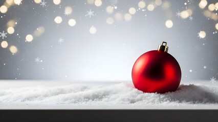 Festive Red Christmas Ornament on Snow with Bokeh Lights Background.