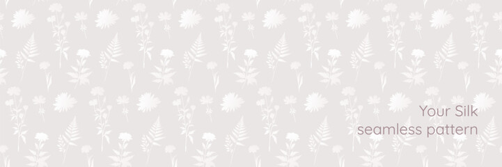 Elegant seamless pattern with white botanical silhouettes of wildflowers and ferns on a light neutral beige background. Elegant floral wallpaper. Sample in swatches. EPS 10 © Tetiana Kubara