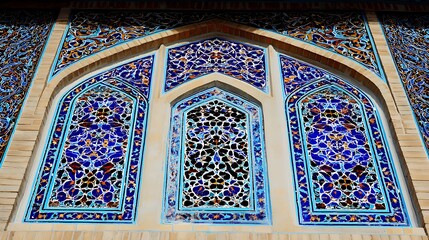 Obraz premium Intricate Mosaic Archway with Geometric Patterns and Floral Motifs.