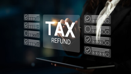 A businesswoman interacts with a digital interface focused on tax refunds, showcasing modern technology to facilitate financial management and client assistance. Gantry
