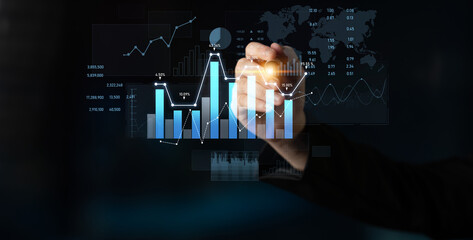 A business professional interacts with a digital display showcasing various graphs and charts, providing insights into financial trends and data analysis. Scalp
