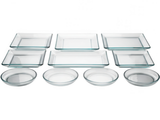 A collection of transparent glass baking dishes in various sizes isolated on transparent background