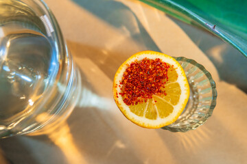 Mezcal drink with lemon and chili powder rim
