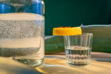 Mezcal shot with lemon slice and chili powder in puebla