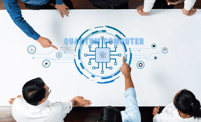 A diverse business team engages in a collaborative discussion over a digital technology concept, featuring circuit board graphics and data visuals on a modern office table. Trope