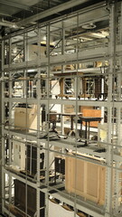 This photo features train set in a street environment.