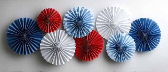 Decorative usa star and stripes paper fans create festive ambiance in a simple setting with space for text display for events or holidays