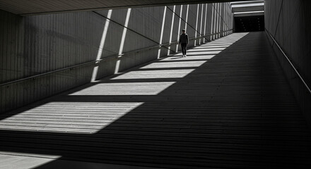 Obraz premium Walking Up Long Concrete Ramp in Minimalist Building
