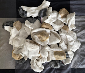 Pile of tennis socks fresh out of the laundry