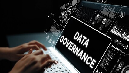 Futuristic Concept of Data Governance with Laptop and Digital Analytics Visualizations in Dark Setting. Asymptotic smart data analytic.