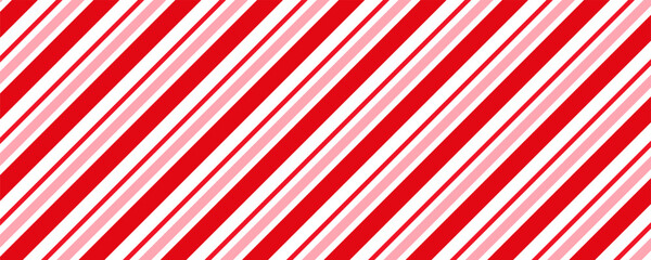 Candy cane Christmas background, peppermint diagonal stripes print seamless pattern