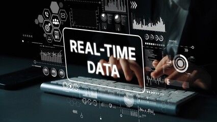 Hands Typing on Keyboard with Real-Time Data Visualizations and Graphs in Modern Digital Workspace. Asymptotic smart data analytic.