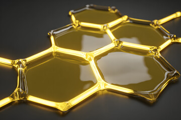 Honeycomb pattern with yellow liquid on dark surface showing unique shapes and texture