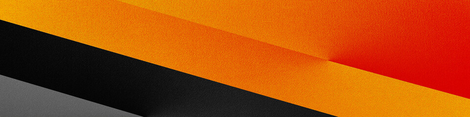 Black dark gray silver fiery red orange gold yellow abstract modern background.Geometric shape.Line stripe diagonal straight triangle angle.Two color contrast.Bright hot glow danger.Design.Wide banner