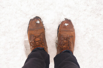 Winter Footwear in Fresh Snow &ndash; Shoes and Boots Leaving Footprints on Snowy Ground, Outdoor Cold Weather Adventure, Seasonal Winter Scene