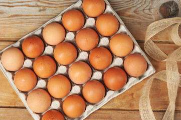 chicken eggs in a cardboard container