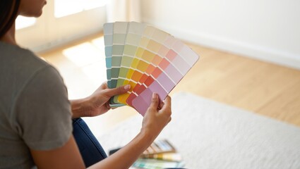 Choosing paint colors for walls using a swatch palette for interior design
