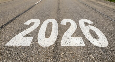 Single road marking showing 2026 on empty asphalt, straight perspective, daylight.