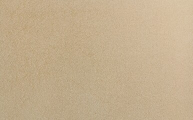 Fototapeta premium Macro shot of neutral beige textured paper or leather surface