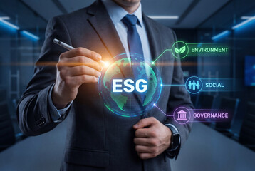 Businessman pointing at ESG Environmental Social Governance digital interface with a globe. Concept of sustainable investing, corporate responsibility, and ethical business strategy in an office.