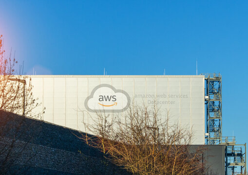 Large scale Amazon AWS AI cloud Datacenter building on a sunny day
