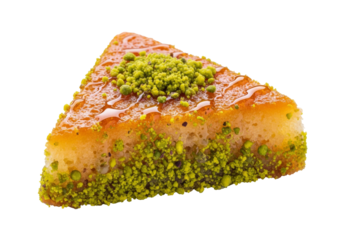 orange pistachio cake slice with glossy glaze and pistachio crust