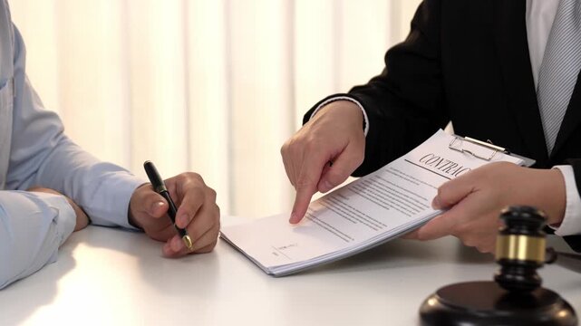 Client rely on law firm to provide legal counsel and advice with lawyers or attorney review, analyze complex legal contract document as trusted corporate law consultation service. Slow motion. Rigid.