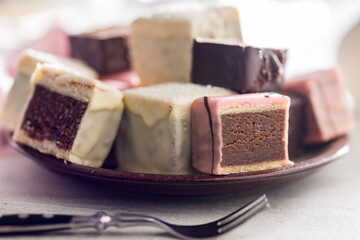 Sweet dessert cake. Mini pie on plate on kitchen table.