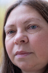 closeup face mature woman 50 years old, human fat neck, gravitational ptosis, double saggy chin, age-related skin changes, cosmetic anti-aging procedures