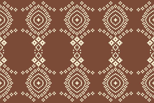 Traditional tribal ethnic pattern embroidery motif with brown color background geometric fabric pattern aztec cloth fashion.