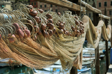fishing nets dry in the Mediterranean port of the fishing town of Camogli in Italy