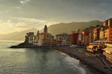 Colorful town Camogli, Liguria on the Mediterranean coast, in warm light of sunset