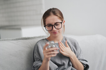 Young Girl Feels Bad At Home And Taking Cough Pills