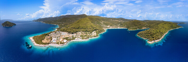 Aerial wide panorama of Panormos Beach, Skopelos island, Greece. Turquoise bay, luxury resort and deep blue Aegean sea, high resolution