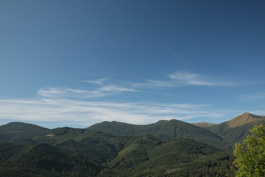 Picturesque view of sky with clouds over mountains