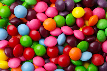 Obraz premium Many delicious colorful candies as background, closeup