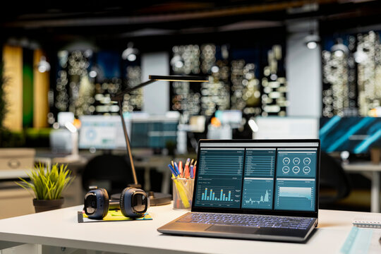 Professional empty office features computers and forecasting equipment. Modern space set for corporate planning, analytics and performance indicators that drive organizational success. - Powered by Adobe